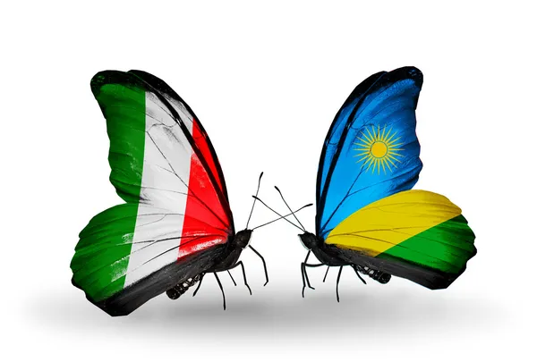 Two butterflies with flags on wings as symbol of relations Italy and Rwanda — Stock Photo, Image