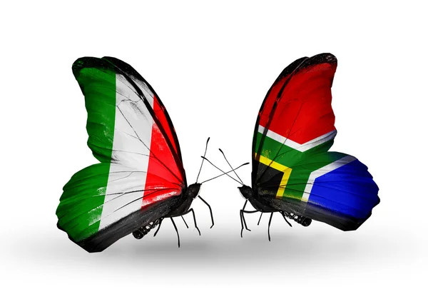 Two butterflies with flags on wings as symbol of relations Italy and South Africa — Stock Photo, Image