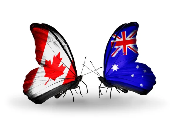 Deux papillons avec des drapeaux sur les ailes comme symbole des relations Canada-Australie — Photo