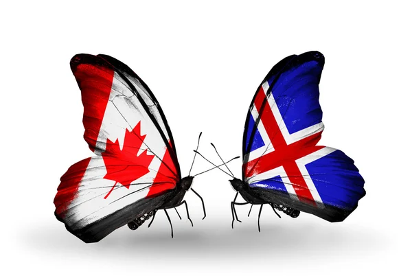 Two butterflies with flags on wings as symbol of relations Canada and Iceland — Stock Photo, Image