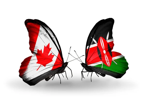 Dos mariposas con banderas en alas como símbolo de relaciones Canadá y Kenia — Foto de Stock