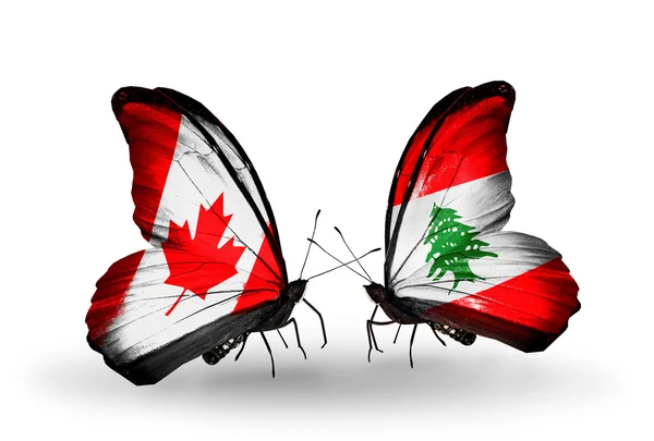 2 つの蝶の翼上のフラグと関係の記号としてカナダ、レバノン — ストック写真