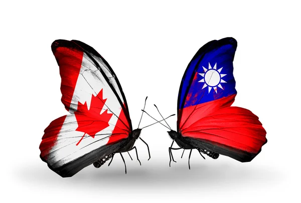 Two butterflies with flags on wings as symbol of relations Canada and Taiwan — Stock Photo, Image