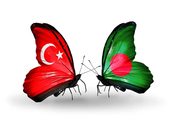 Two butterflies with flags on wings as symbol of relations Turkey and Bangladesh — Stock Photo, Image