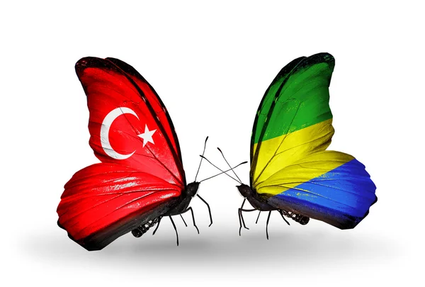 Iki kelebek kanatları ilişkiler Türkiye ve gabon sembolü olarak bayrakları ile — Stok fotoğraf
