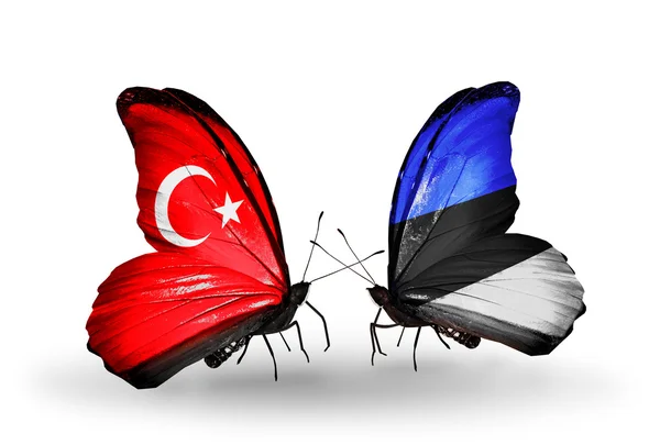 Dos mariposas con banderas en alas como símbolo de relaciones Turquía y Estonia —  Fotos de Stock