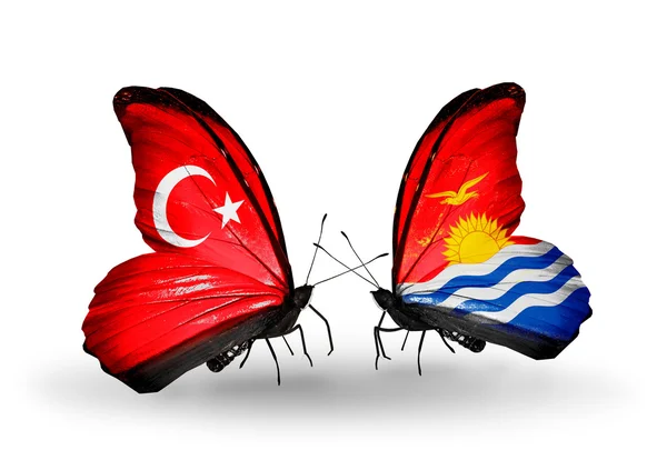 Two butterflies with flags on wings as symbol of relations Turkey and Kiribati — Stock Photo, Image