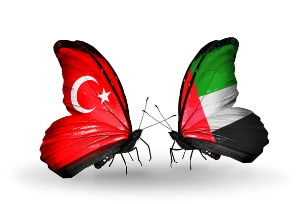 Two butterflies with flags on wings as symbol of relations Turkey and UAE — Stock Photo, Image