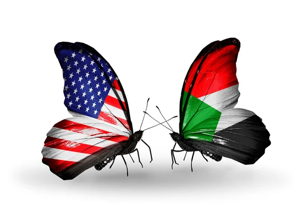 Two butterflies with flags on wings as symbol of relations USA and Sudan — Stock Photo, Image
