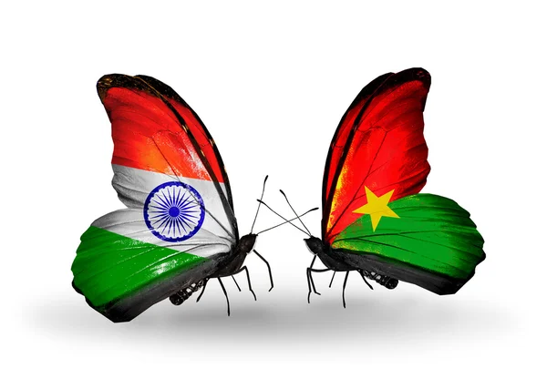 Two butterflies with flags on wings as symbol of relations India and Burkina Faso — Stock Photo, Image