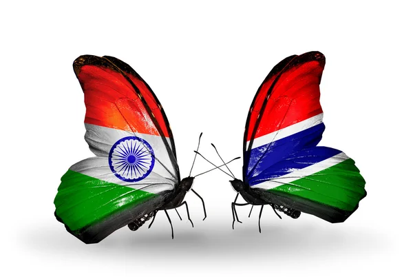 Dos mariposas con banderas en alas como símbolo de relaciones India y Gambia — Foto de Stock