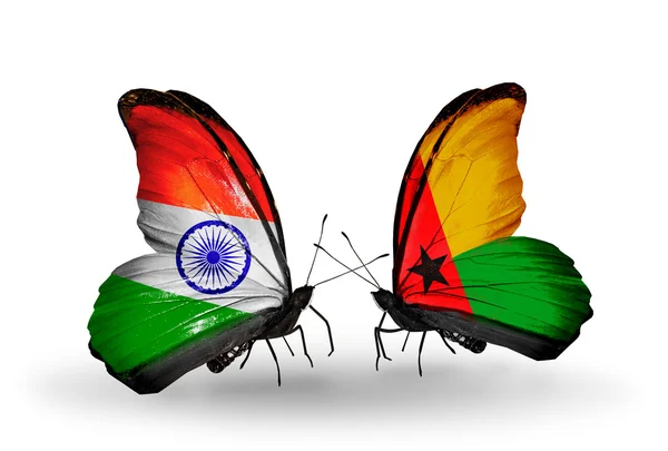 Two butterflies with flags on wings as symbol of relations India and Guinea Bissau — Stock Photo, Image