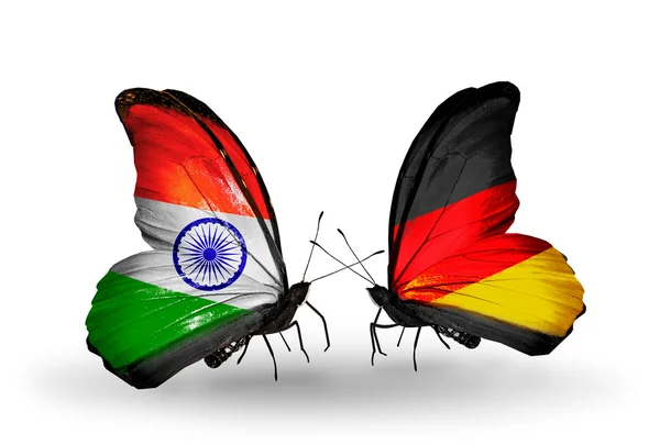 Dos mariposas con banderas en alas como símbolo de relaciones India y Alemania —  Fotos de Stock