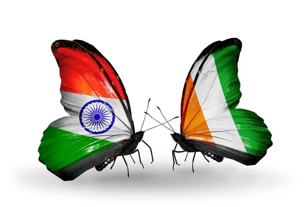 Two butterflies with flags on wings as symbol of relations India and Cote Divoire — Stock Photo, Image