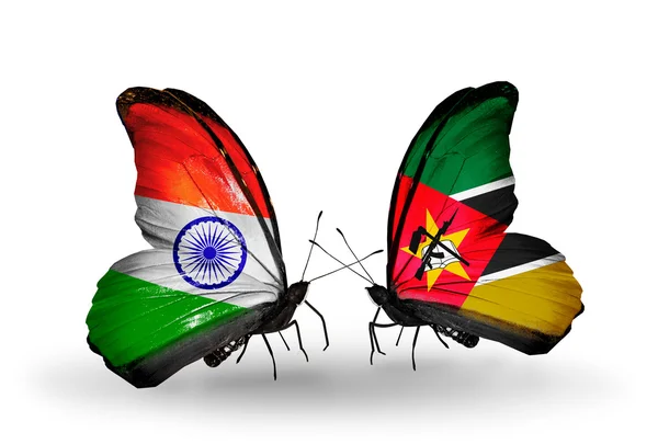 Two butterflies with flags on wings as symbol of relations India and Mozambique — Stock Photo, Image