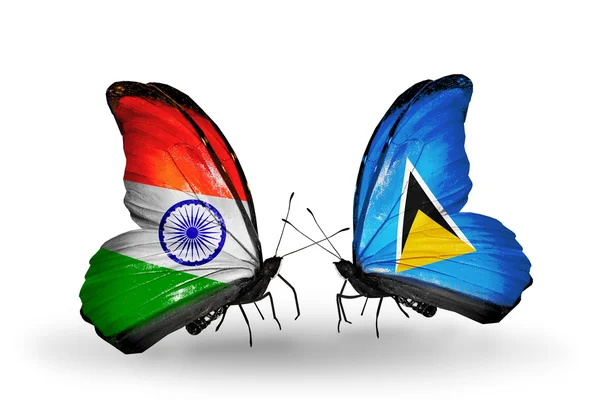 Duas borboletas com bandeiras nas asas como símbolo das relações Índia e Santa Lúcia — Fotografia de Stock