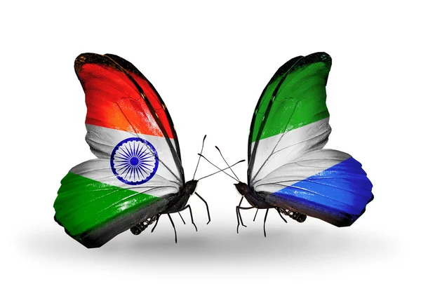 Two butterflies with flags on wings as symbol of relations India and Sierra Leone — Stock Photo, Image