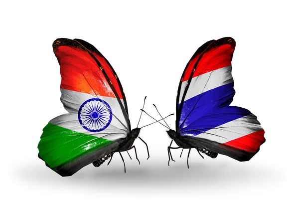 Two butterflies with flags on wings as symbol of relations India and Thailand — Stock Photo, Image