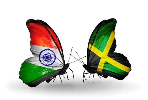 Dos mariposas con banderas en alas como símbolo de relaciones India y Jamaica —  Fotos de Stock