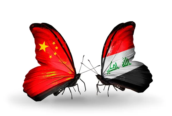 Due farfalle con bandiere sulle ali come simbolo delle relazioni Cina e Iraq — Foto Stock