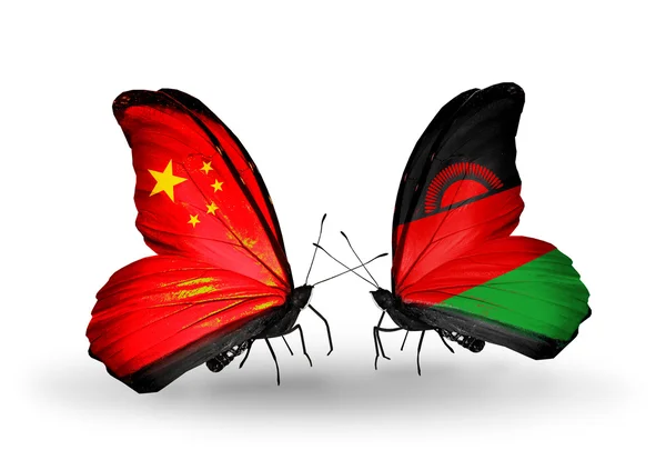 Two butterflies with flags on wings as symbol of relations China and Malawi — Stock Photo, Image