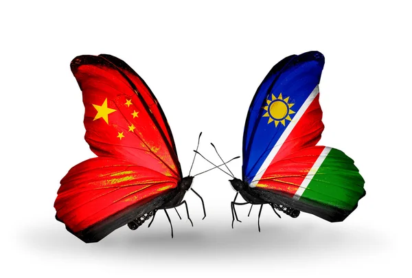 Iki kelebek kanatları ilişkileri Çin ve Namibya sembolü olarak bayrakları ile — Stok fotoğraf