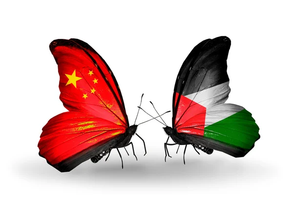 Two butterflies with flags on wings as symbol of relations China and Palestine — Stock Photo, Image