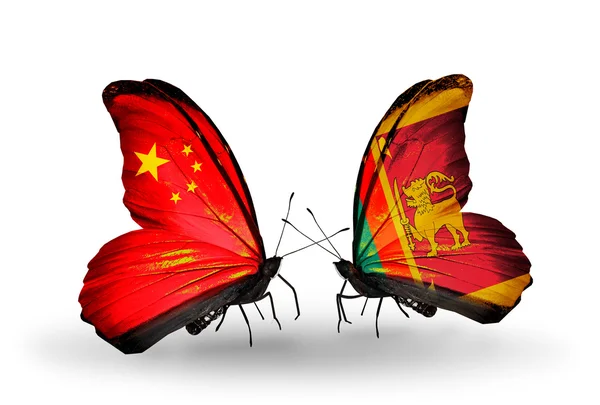 Two butterflies with flags on wings as symbol of relations China and Sri Lanka — Stock Photo, Image