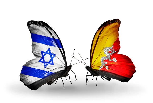 Dwa motyle z flagami na skrzydłach jako symbol stosunków Izraela i Bhutanu — Zdjęcie stockowe