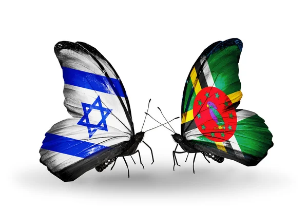 Twee vlinders met vlaggen op vleugels als symbool van de betrekkingen, Israël en dominica — Stockfoto