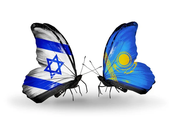 Dwa motyle z flagami na skrzydłach jako symbol stosunków, Izrael i Kazachstan — Zdjęcie stockowe