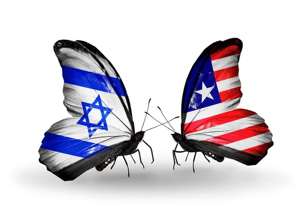 Zwei Schmetterlinge mit Flaggen auf Flügeln als Symbol der Beziehungen zwischen Israel und Liberia — Stockfoto
