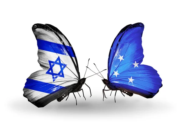 Deux papillons avec des drapeaux sur les ailes comme symbole des relations Israël et la Micronésie — Photo