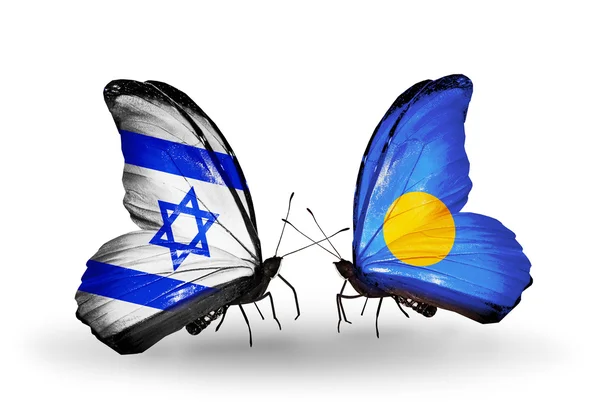 Dwa motyle z flagami na skrzydło symbol stosunków Izraela i palau — Zdjęcie stockowe
