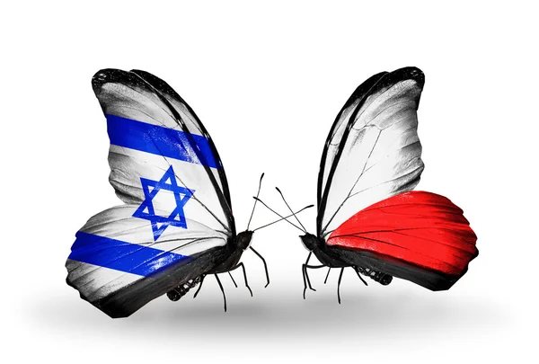Två fjärilar med flaggor på vingarna som symbol för förbindelserna mellan israel och Polen — Stockfoto