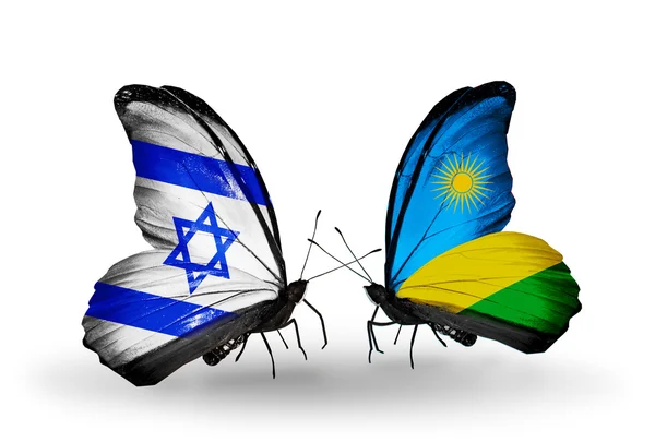 Dos mariposas con banderas en las alas como símbolo de las relaciones Israel y Ruanda —  Fotos de Stock