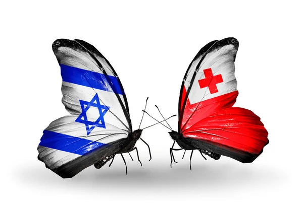 Deux papillons avec des drapeaux sur les ailes comme symbole des relations Israël et Tonga — Photo