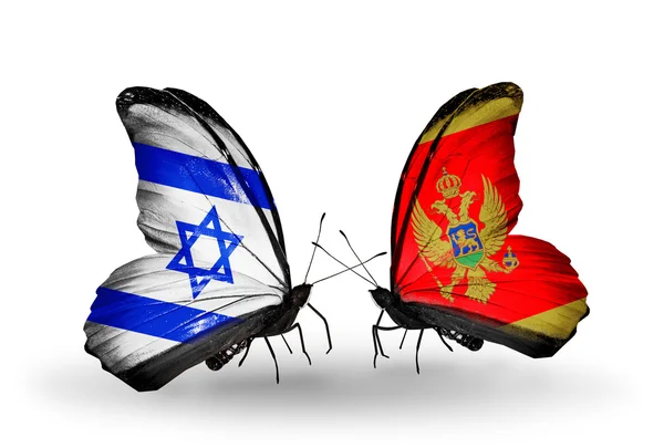 Dwa motyle z flagami na skrzydłach jako symbol stosunków Izraela i Czarnogóra — Zdjęcie stockowe