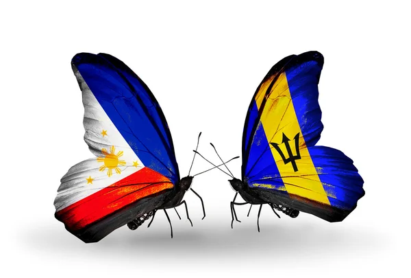 Dos mariposas con banderas en alas como símbolo de relaciones Filipinas y Barbados — Foto de Stock