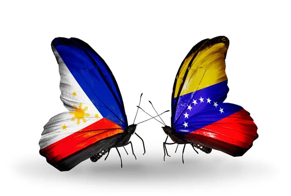 Two butterflies with flags on wings as symbol of relations Philippines and Venezuela — Stock Photo, Image