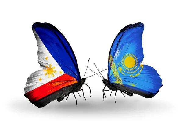 Two butterflies with flags on wings as symbol of relations Philippines and Kazakhstan — Stock Photo, Image