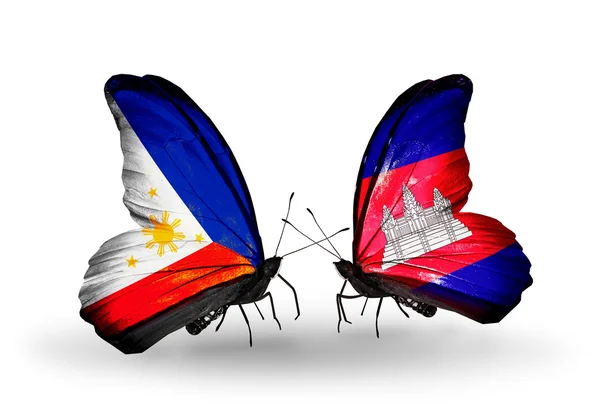 Dwa motyle z flagami na skrzydłach jako symbol stosunków, Kambodży i Filipin — Zdjęcie stockowe