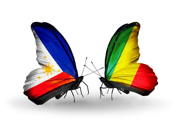 Two butterflies with flags on wings as symbol of relations Philippines and Kongo — Stock Photo, Image