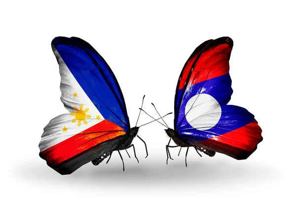 Two butterflies with flags on wings as symbol of relations Philippines and Laos — Stock Photo, Image