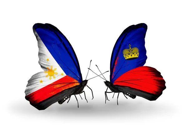 Two butterflies with flags on wings as symbol of relations Philippines and Liechtenstein — Stock Photo, Image