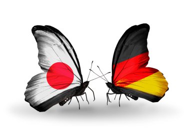 iki kelebek kanatları ilişkileri Japonya ve Almanya sembolü olarak bayrakları ile