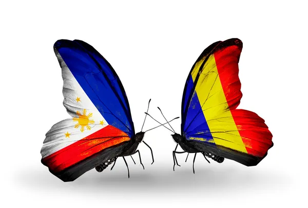 Dva motýli s příznaky na křídlech jako symbol vztahy Filipín a Čadu, Rumunsko — Stock fotografie