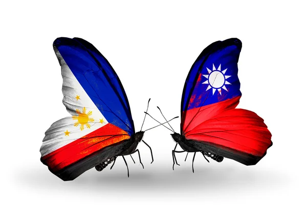 Two butterflies with flags on wings as symbol of relations Philippines and Taiwan — Stock Photo, Image