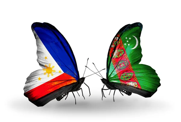 Dwa motyle z flagami na skrzydłach jako symbol stosunków, Filipiny i turkmenistan — Zdjęcie stockowe