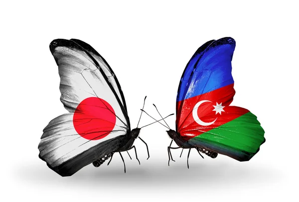 Two butterflies with flags on wings as symbol of relations Japan and Azerbaijan — Stock Photo, Image